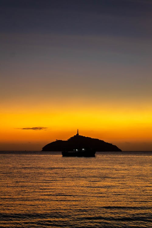 Foto profissional grátis de barco, crepúsculo, mar do caribe