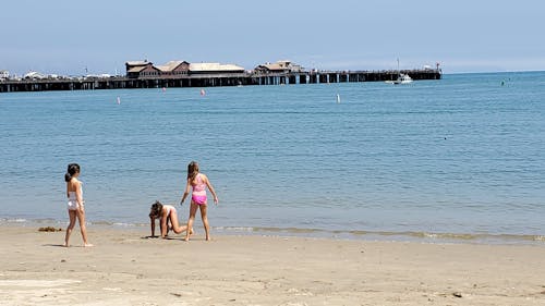 Free stock photo of at the beach, children playing, pier Stock Photo