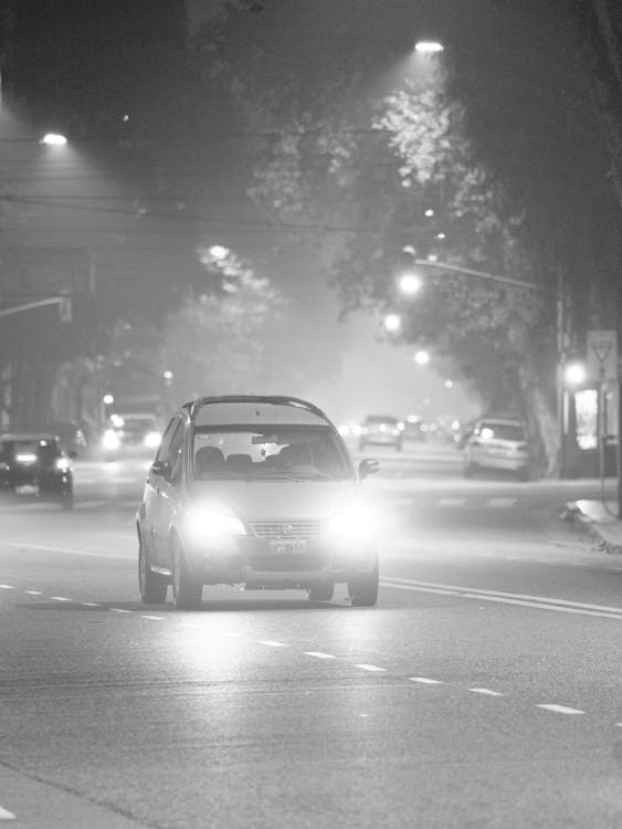 Photo of a Moving Car on the Road 