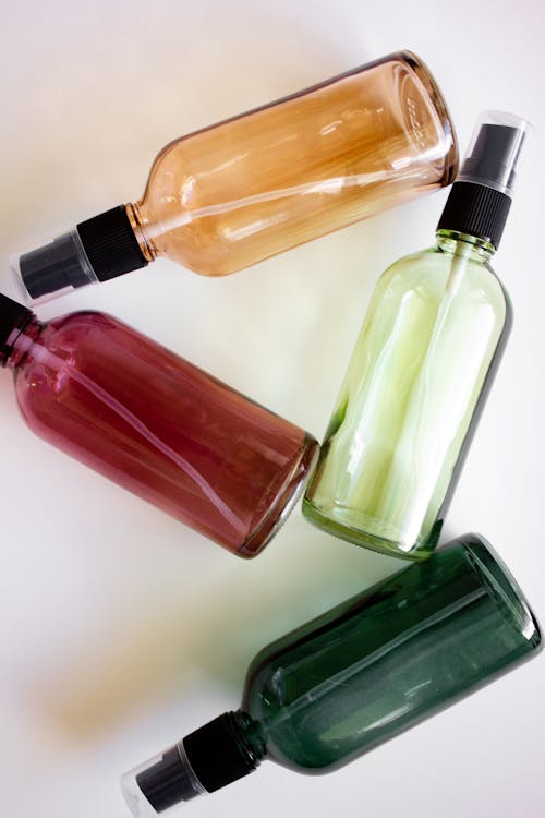 Colorful Empty Plastic Bottles on White Background