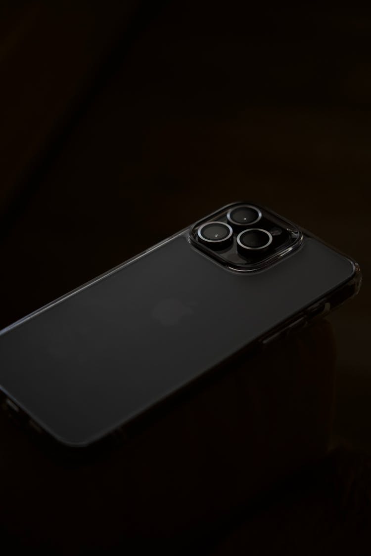 Close Up Photo Of Black Iphone On Black Background