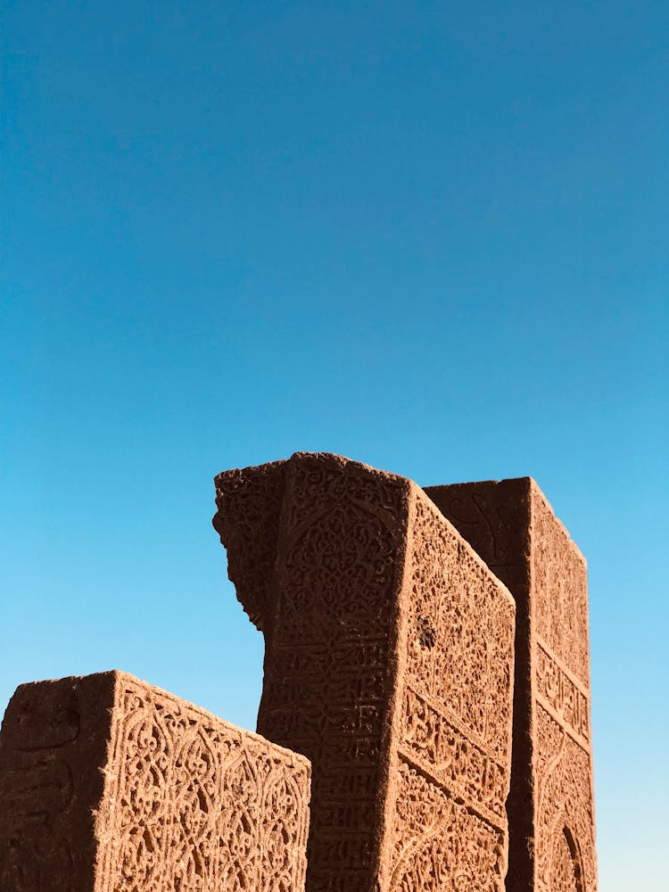 Ahlat Stonework Pillars Against Blue Sky