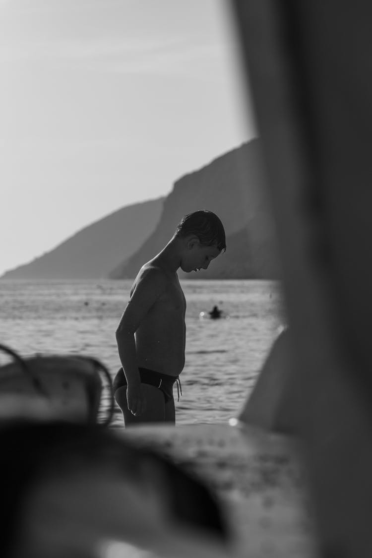 Teenager On Sea Shore In Black And White