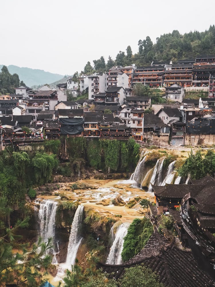 Village Surrounding Waterfalls