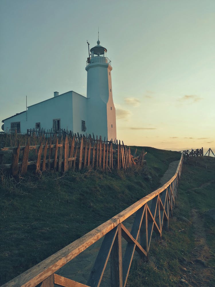 Lighthouse At Sunrise