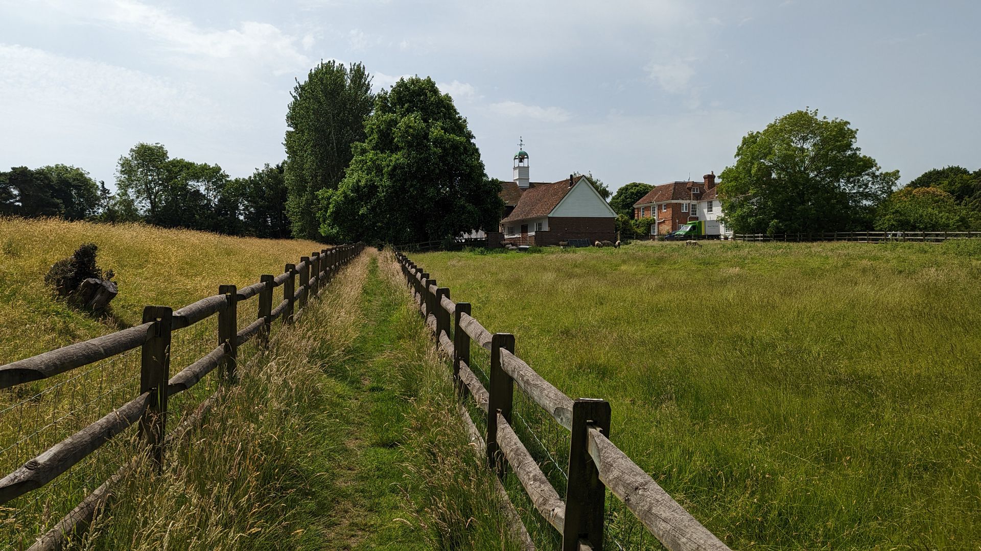 Green Kent countryside with traditional homes