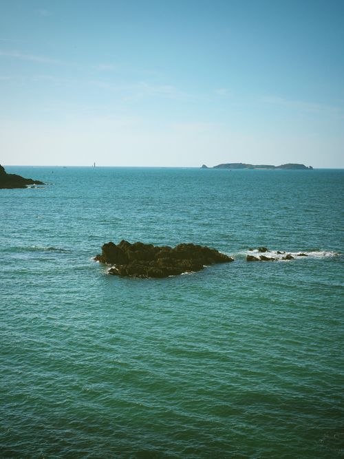 Free A serene ocean view showcasing Brittany's coastline under a clear blue sky. Stock Photo