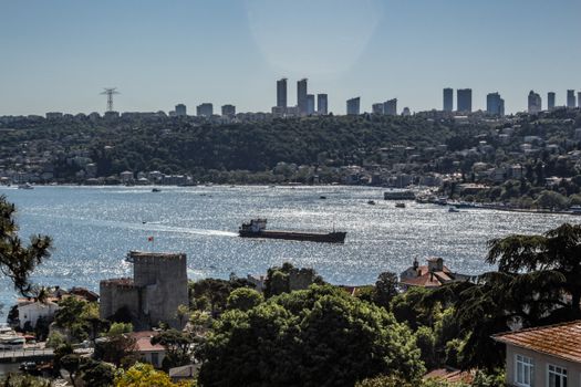A stunning cityscape of the Bosporus in Istanbul with ships and urban skyline.