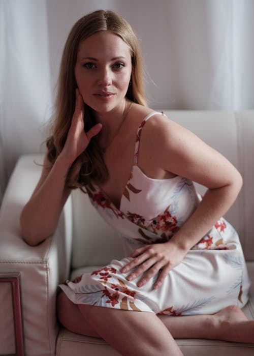 A Beautiful Woman Wearing White Floral Dress