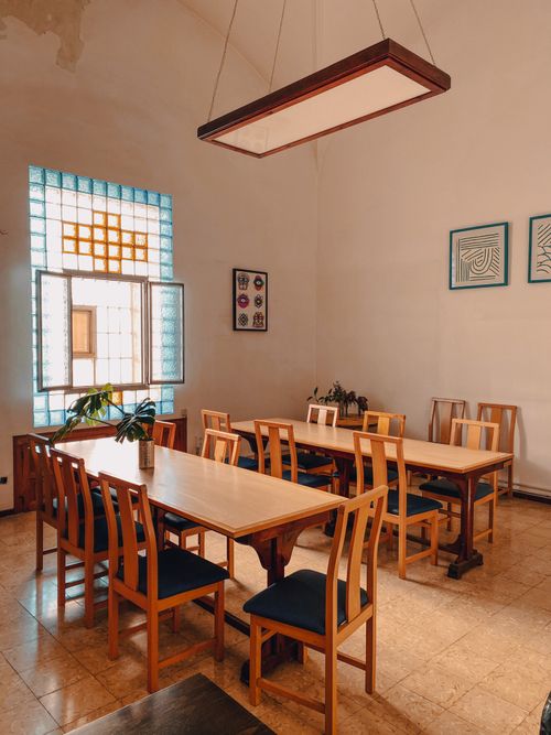 Free Wooden furniture in a brightly lit dining room, Palafrugell, Spain Stock Photo