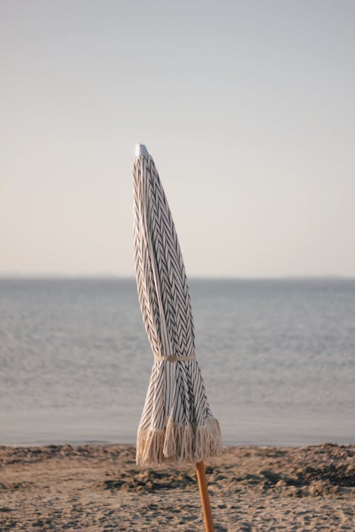 A Tied Beach Umbrella at the Beach