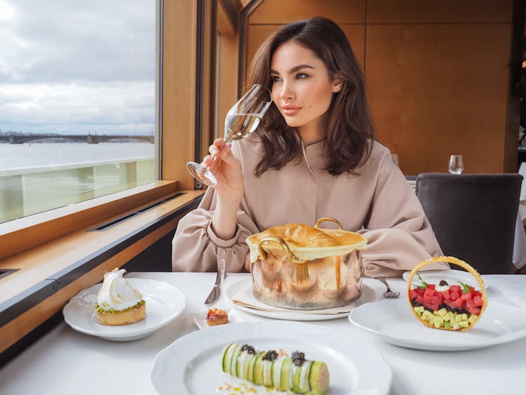 Beautiful Woman Eating A Meal On A Cruise