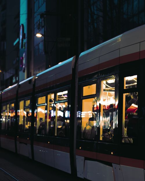 Free Night view of a tram in Eskişehir, Turkey, showcasing urban nightlife and transportation. Stock Photo