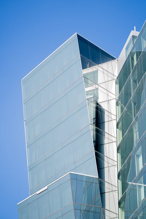 Low Angle Shot of a Glass Building 