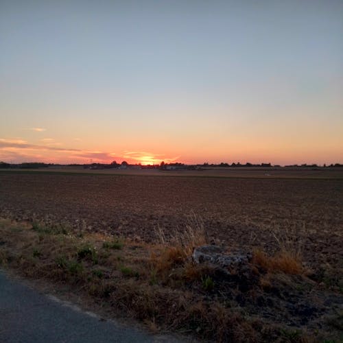 Fotos de stock gratuitas de campo, paisaje, puesta de sol