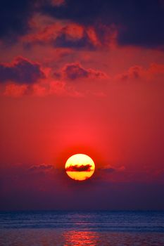 Beautiful sunset over the ocean in Dhonfanu, Baa Atoll, Maldives, with vibrant colors.