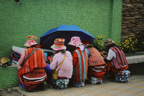 Backview of Elderly People in Traditional Wear 