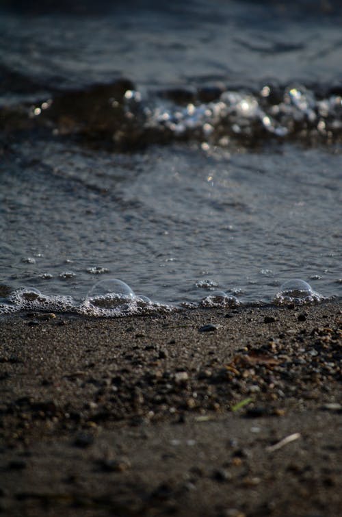 Water on Sand in Tilt-shift Lens 