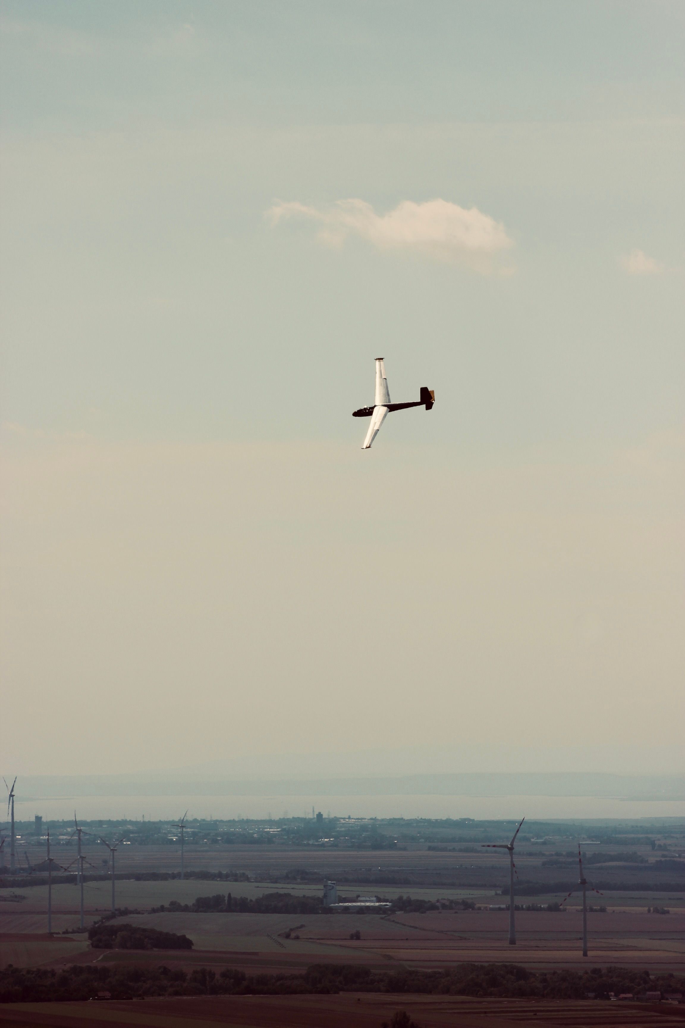 Black and White Aviation Plane Arriving during Sunset · Free Stock Photo