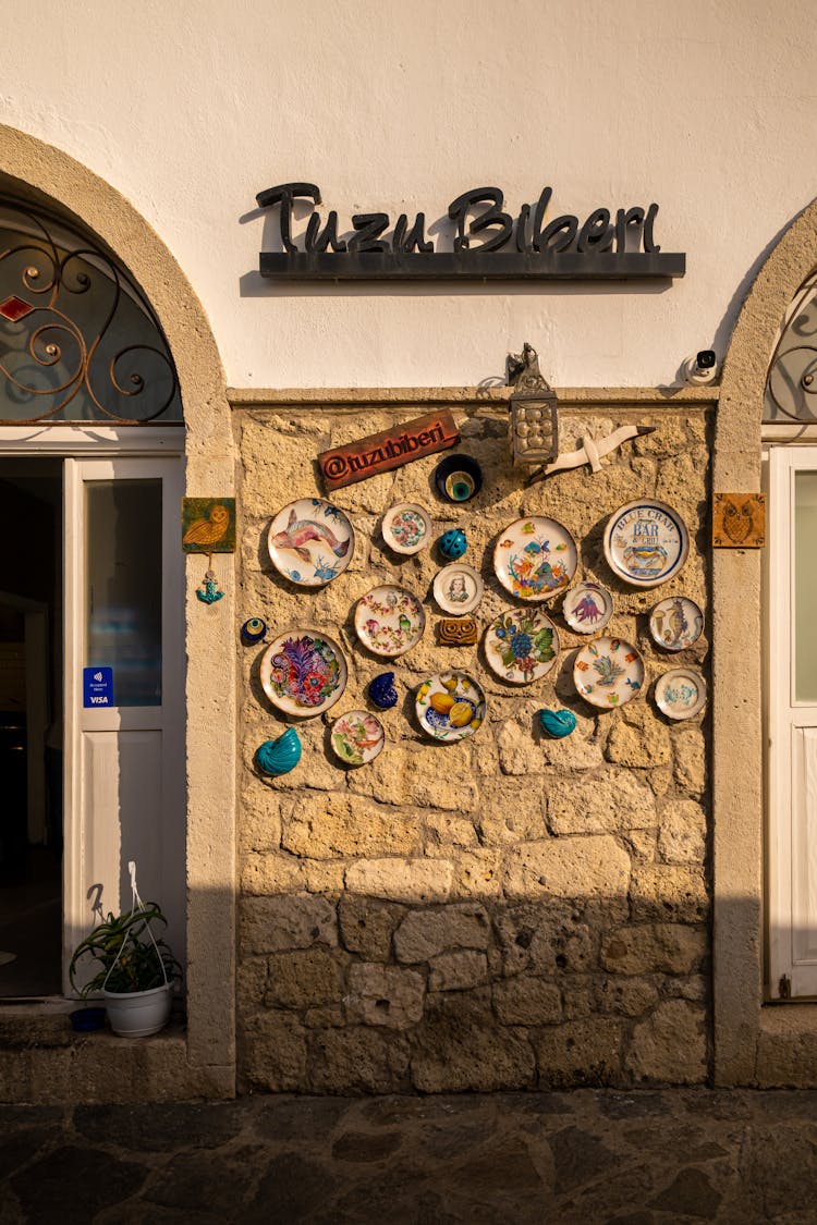 Decoratives On A Cobblestone Wall 