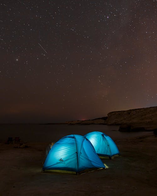 Blue Tents Under Starry Night