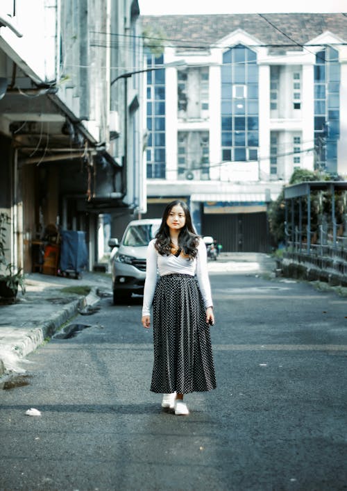 Woman Wearing Long Skirt on a Street 