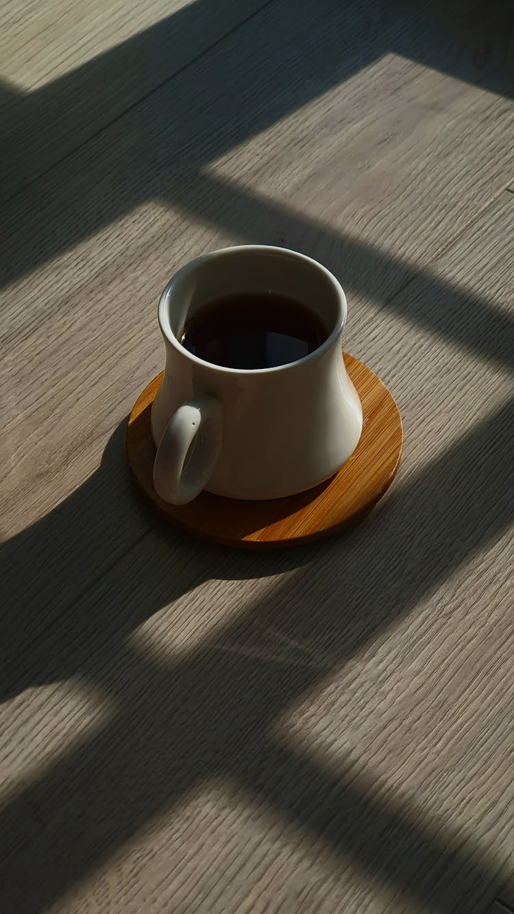 A Cup Of Coffee On A Coaster 