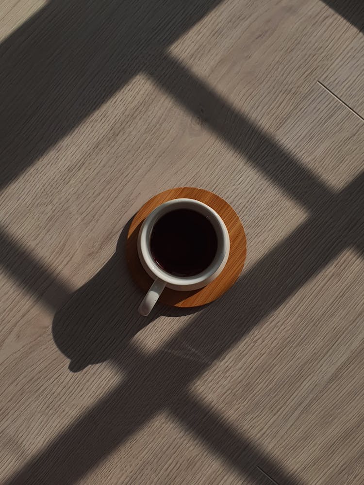 A Cup Of Coffee On A Coaster 