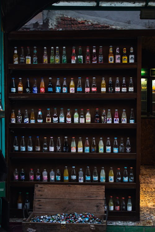 Beer Bottles on a Cabinet 