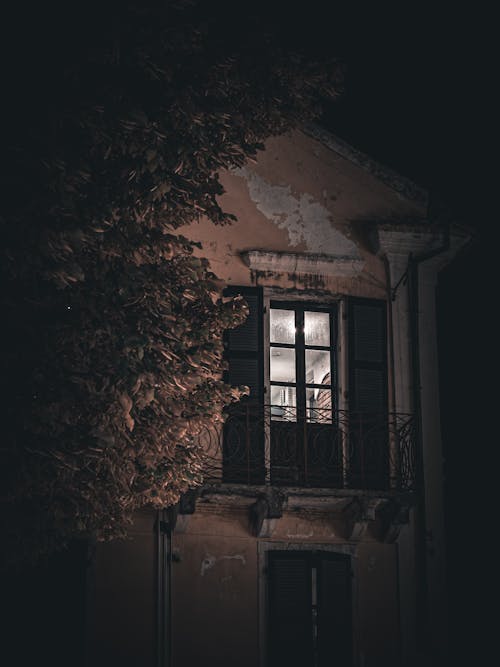 Window in an Old Tenement at Night 