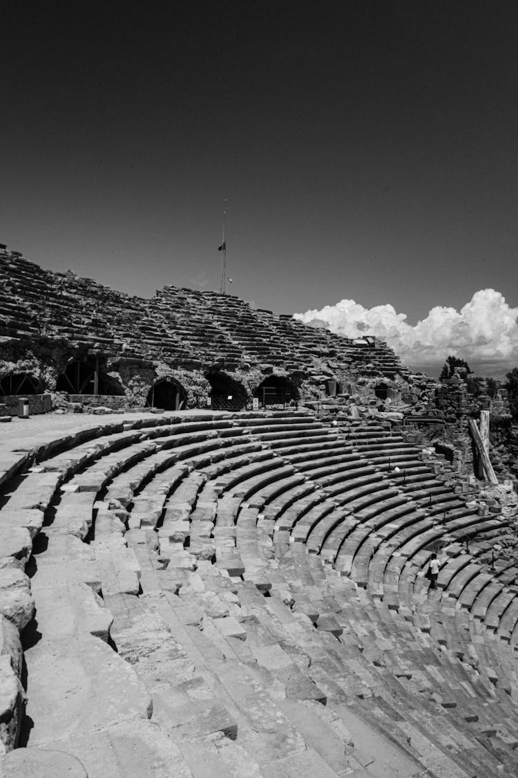 Ancient Amphitheater On Sky Background