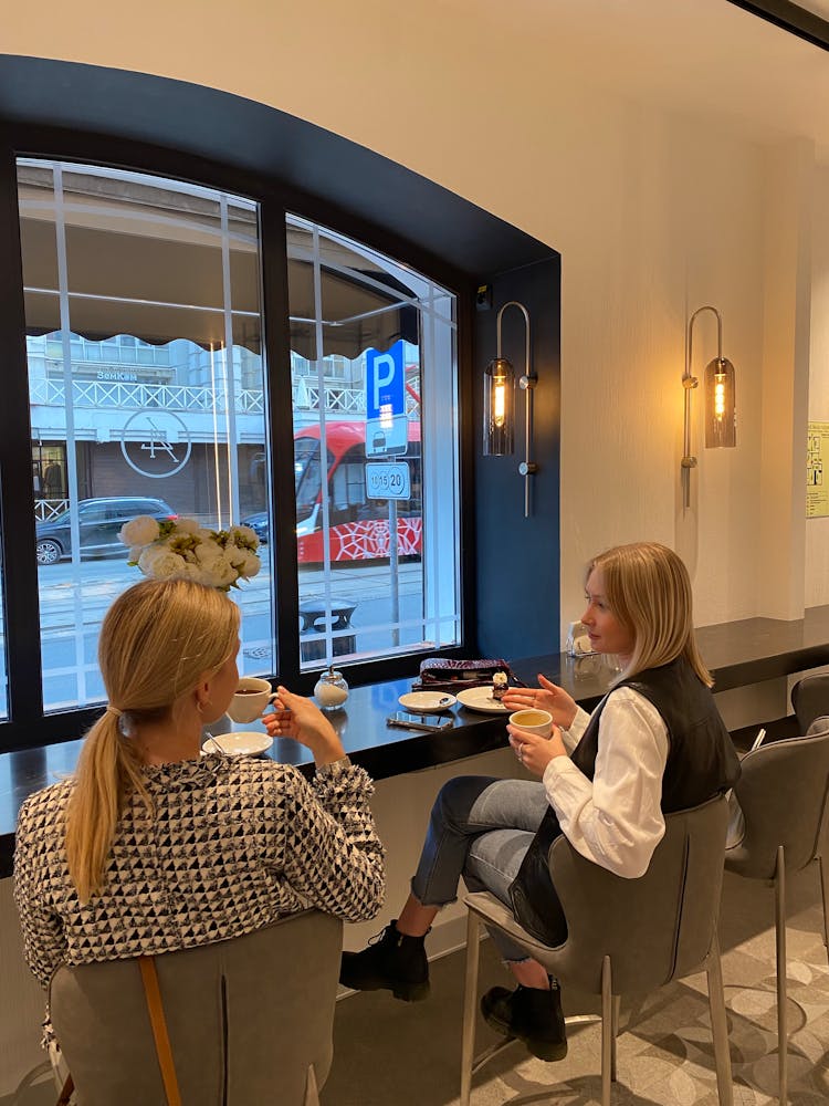 Women Drinking Coffee In A Coffee Shop