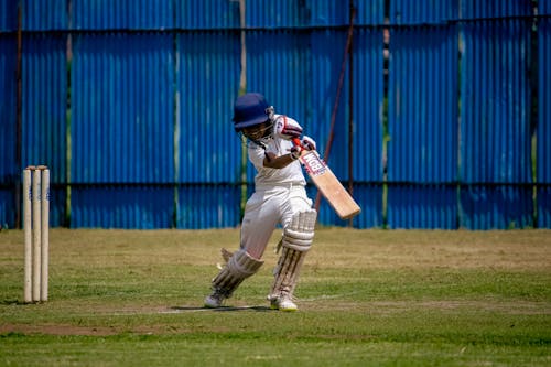 A Boy Playing Cricket