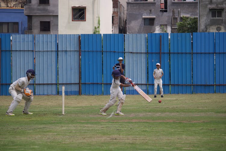 Kids Playing Cricket