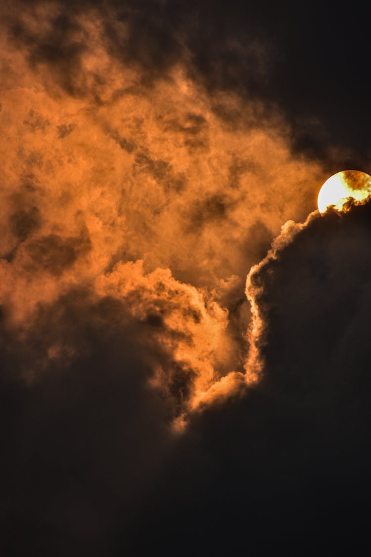 Dark Clouds Covering The Moon In The Sky