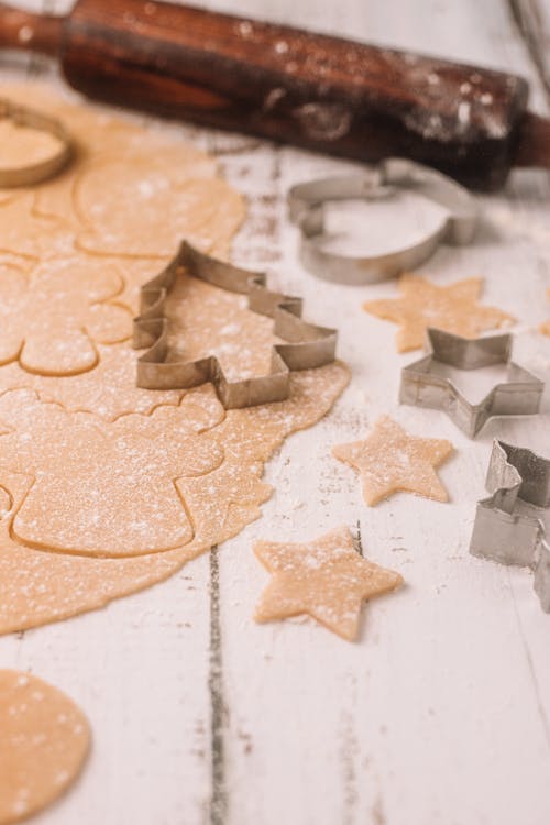 Photo of a Rolled Dough and Cookie Cutters