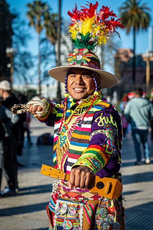 Portrait of Smiling Man in Colorful, Traditional Clothing