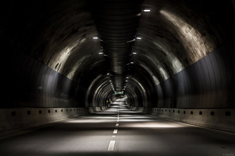 Photograph Of A Tunnel With Lights