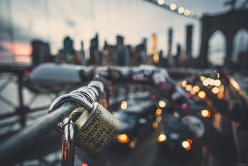 Depth of Field Photography of Padlocks on a Bridge