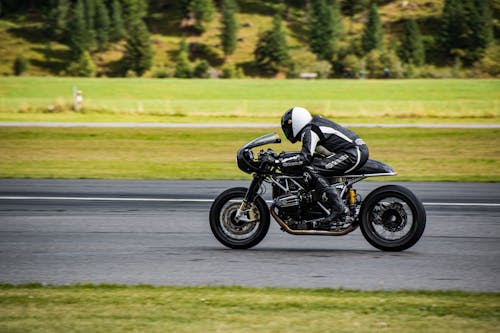 Side View of a Person Riding a Motorcycle