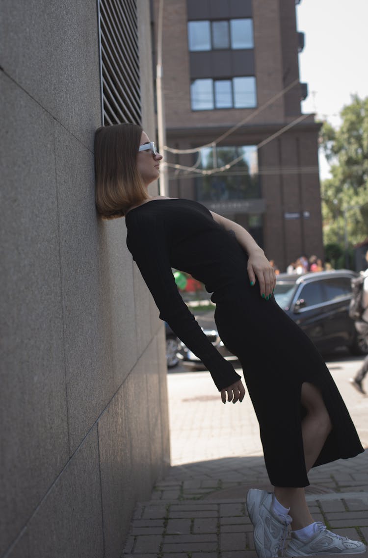 Model Posing In Dress In City