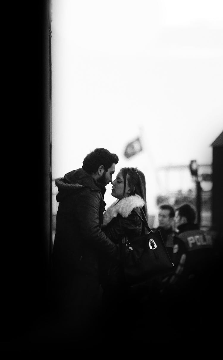 Couple Hugging Kissing On Street