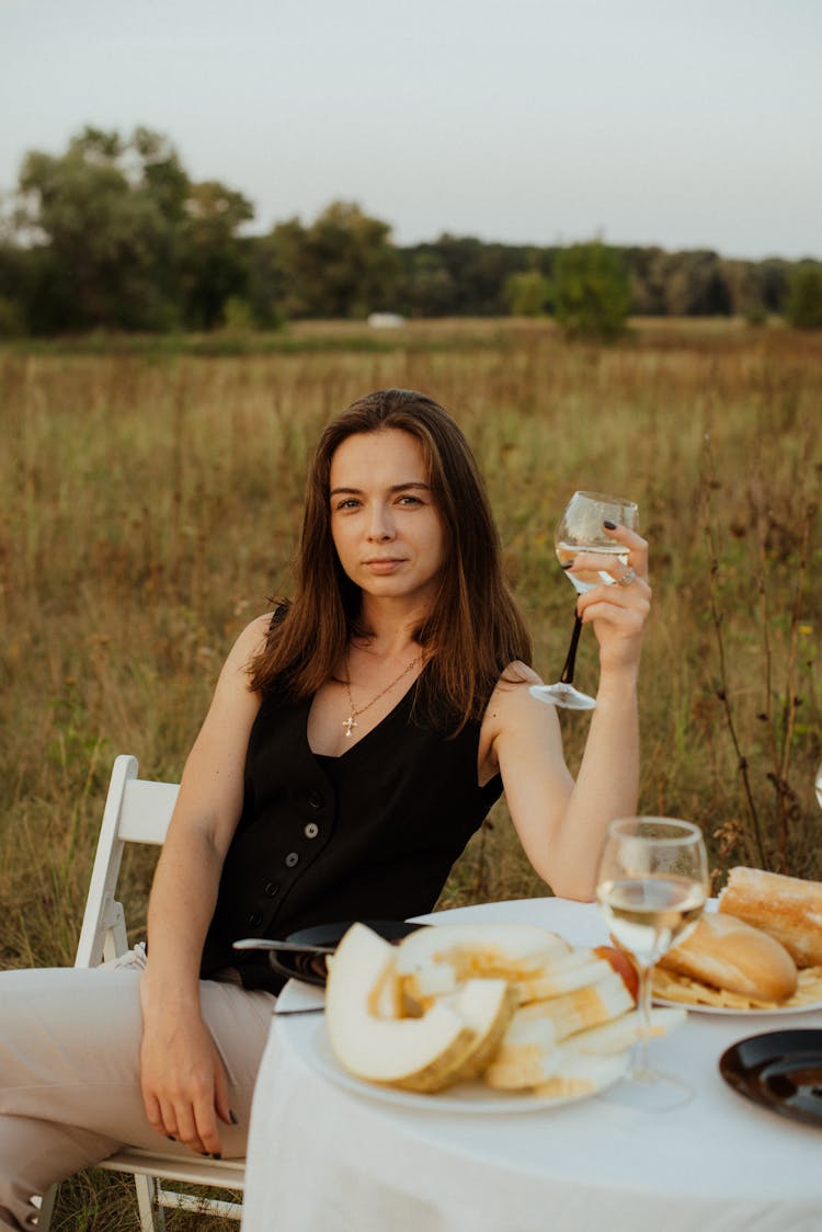 Portrait Of Beautiful Woman Drinking Wine On Picnic