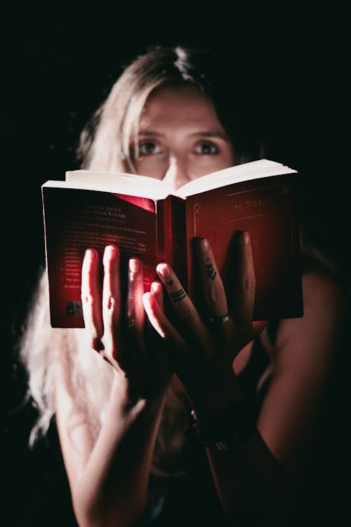 Woman Holding a Book