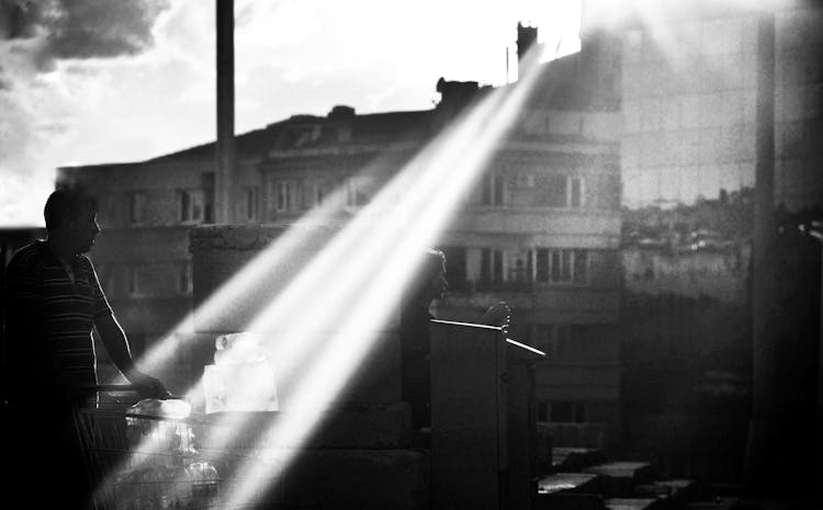 Sunbeam Above People Heads In Street