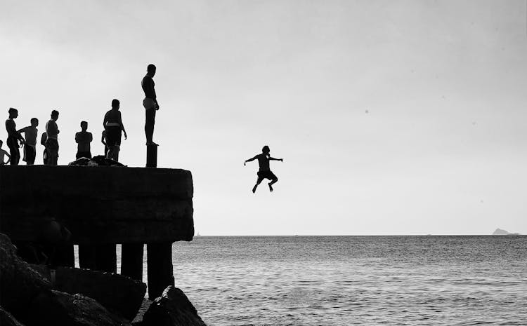 Person Jumping In To The Sea