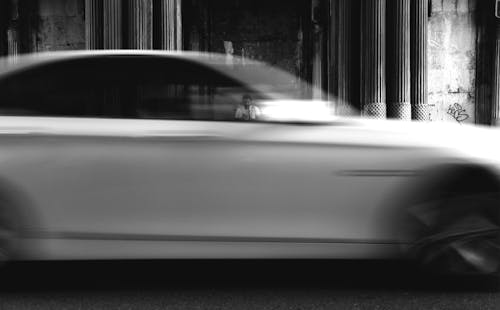 Free Blurred Car in Motion Stock Photo