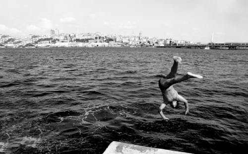 Man Jumping into Sea