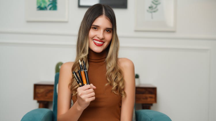 Woman Holding A Fountain Pens