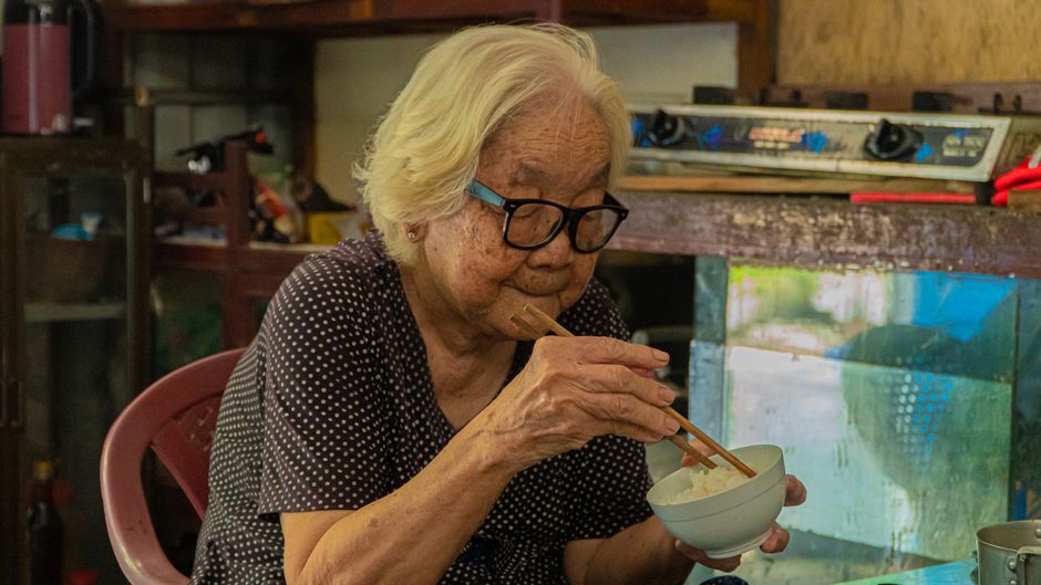 healthy korean food, senior woman eating